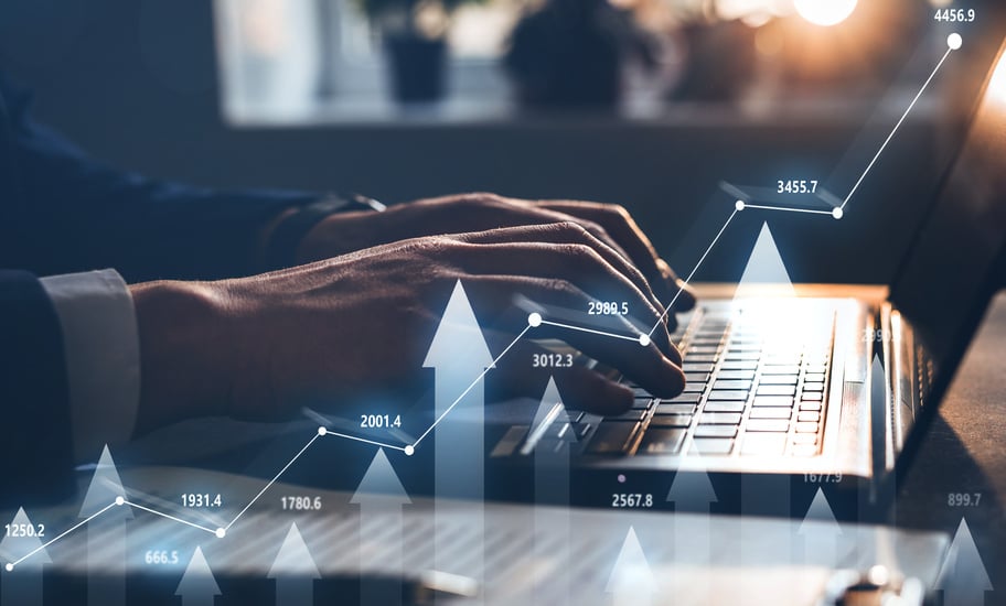 Businessman using laptop for analyzing data stock market. Forex trading graph concept. Trading forex data information.